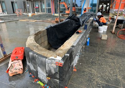 Stone cladding being applied