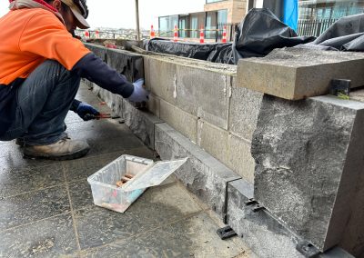 Stone cladding being applied