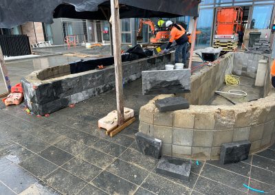 Stone cladding being applied